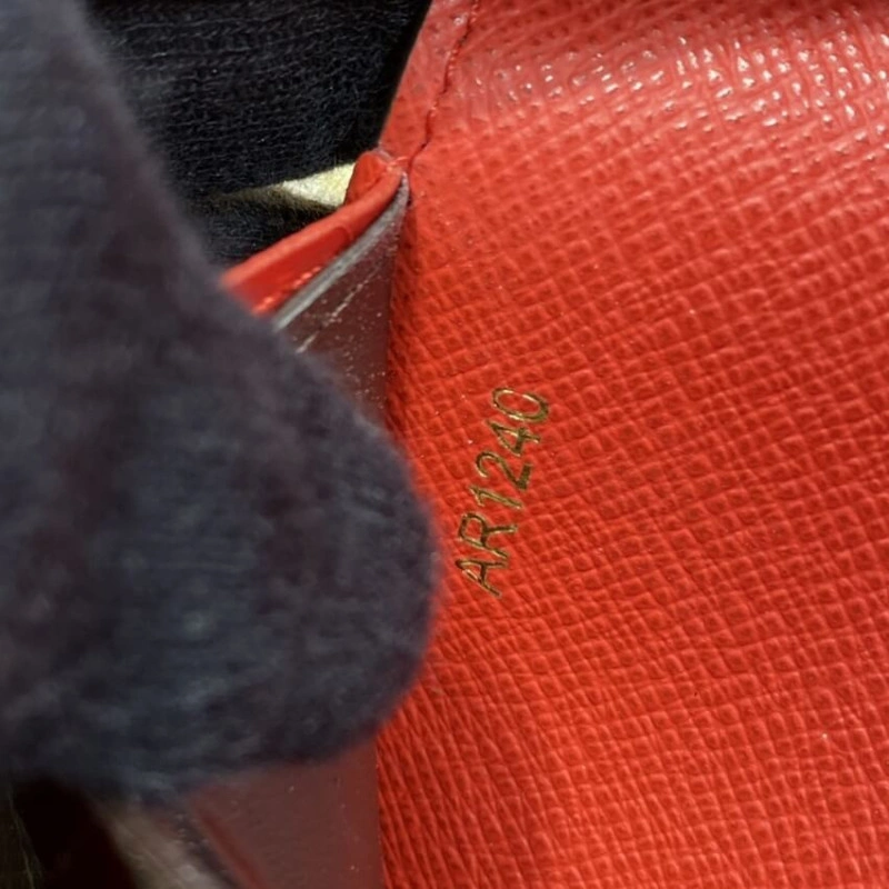 Proving th Louis Vuitton Monogram Canvas Emilie Wallet Red - Image 9