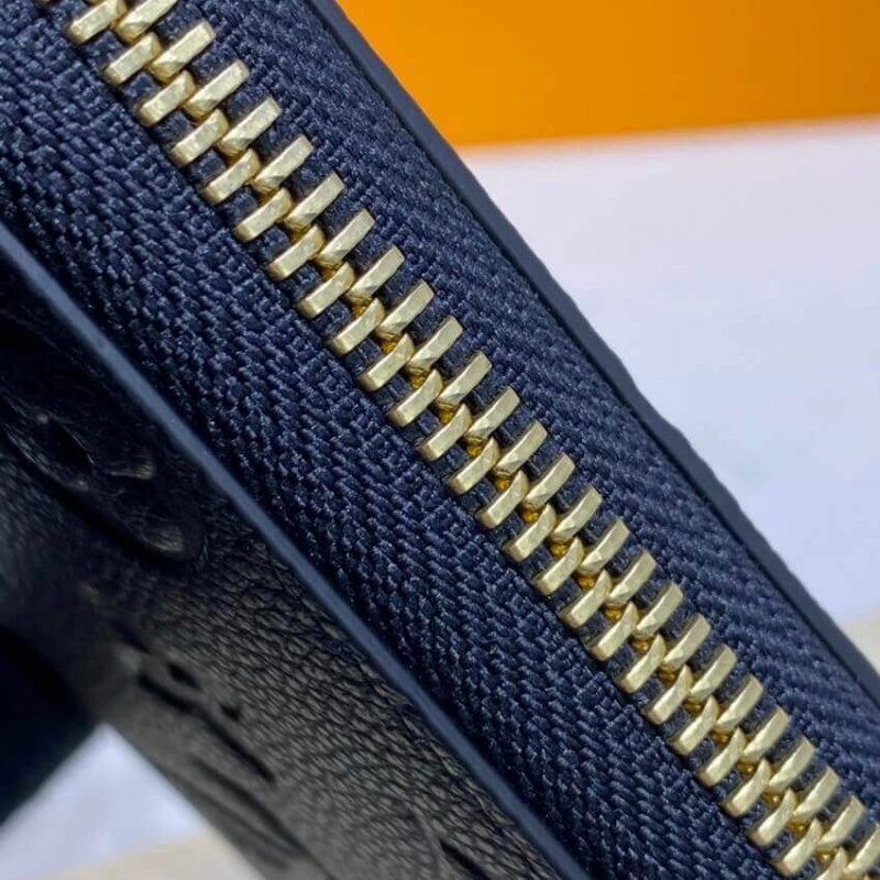 Supple gr Louis Vuitton Monogram Empreinte Leather Clemence Wallet Black - Image 6