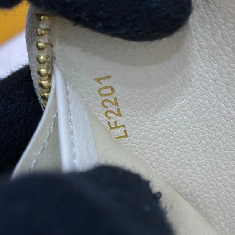 Louis Vuitton Monogram Empreinte Leather with Animal-Print Zippy Wallet Cream - Image 10